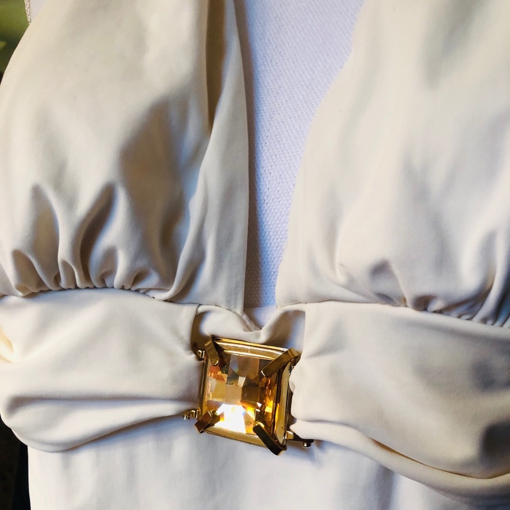 Ivory bathing suit w/gold embellishment. Size 10.